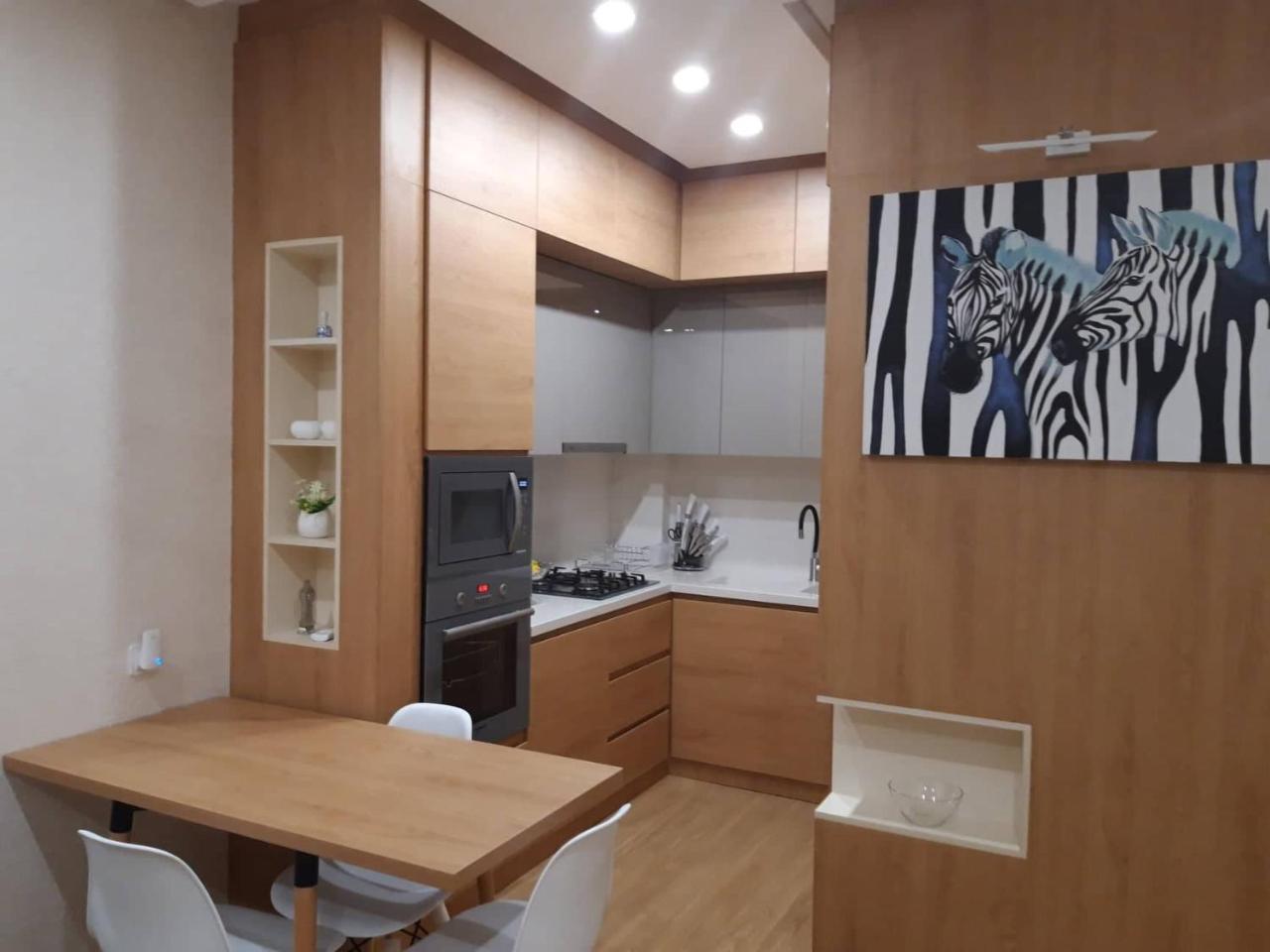 1 Apartament *